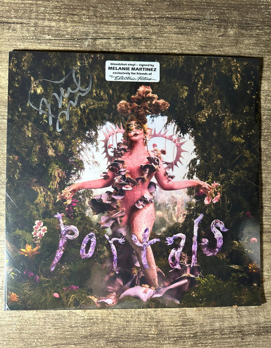 PORTALS (LIMITED EDITION BLOODSHOT TRANSLUCENT VINYL)